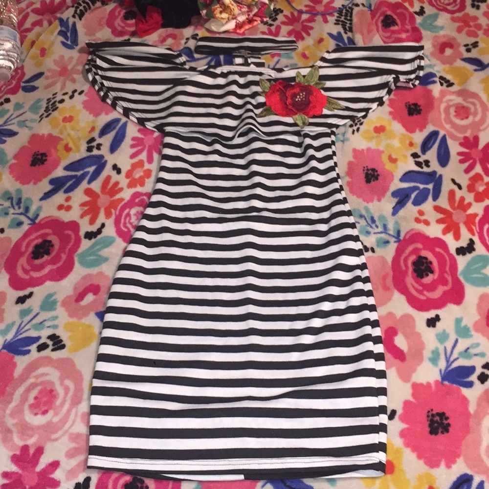 A white and black stripped dress, Off shoulder .